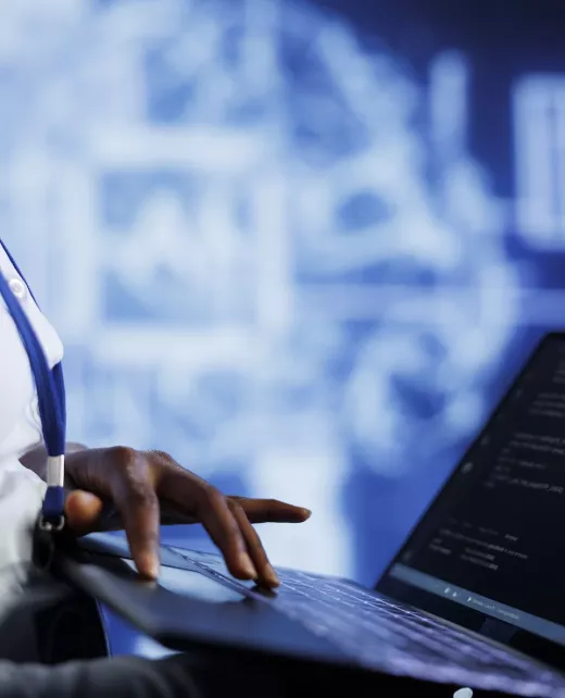 professional-writes-ai-code-laptop professional-writes-ai-code-laptop